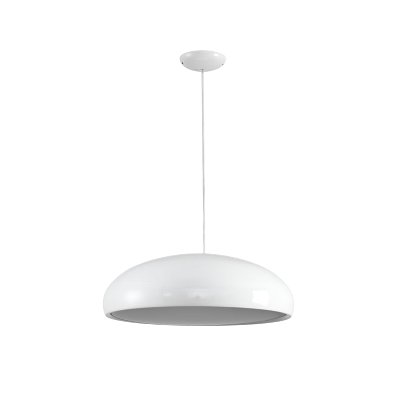 Lifestyle image of the Aicia Pendant Light in a cozy reading corner.