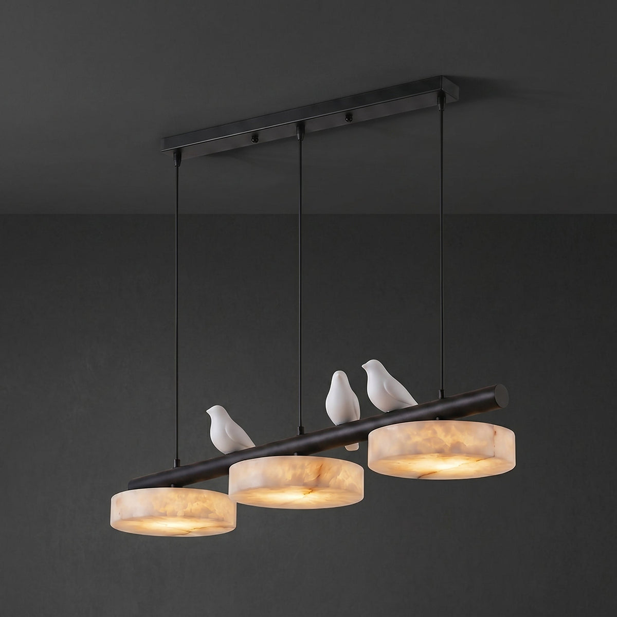 Sienna chandelier illuminating a room with a warm, soft light.