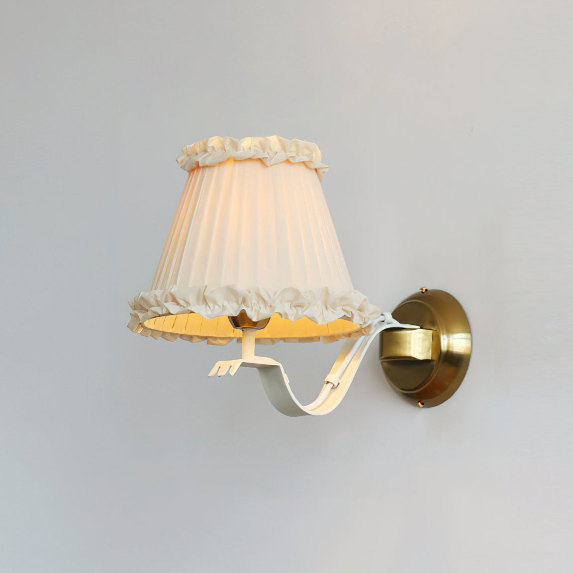 Top-down view of the ruffled fabric shade.