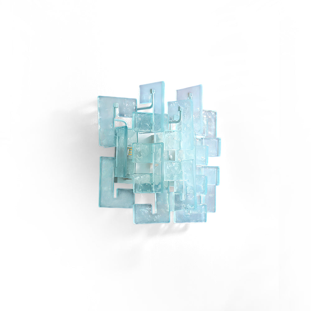 Stagger Cast Glass Sconce in a modern hallway setting.