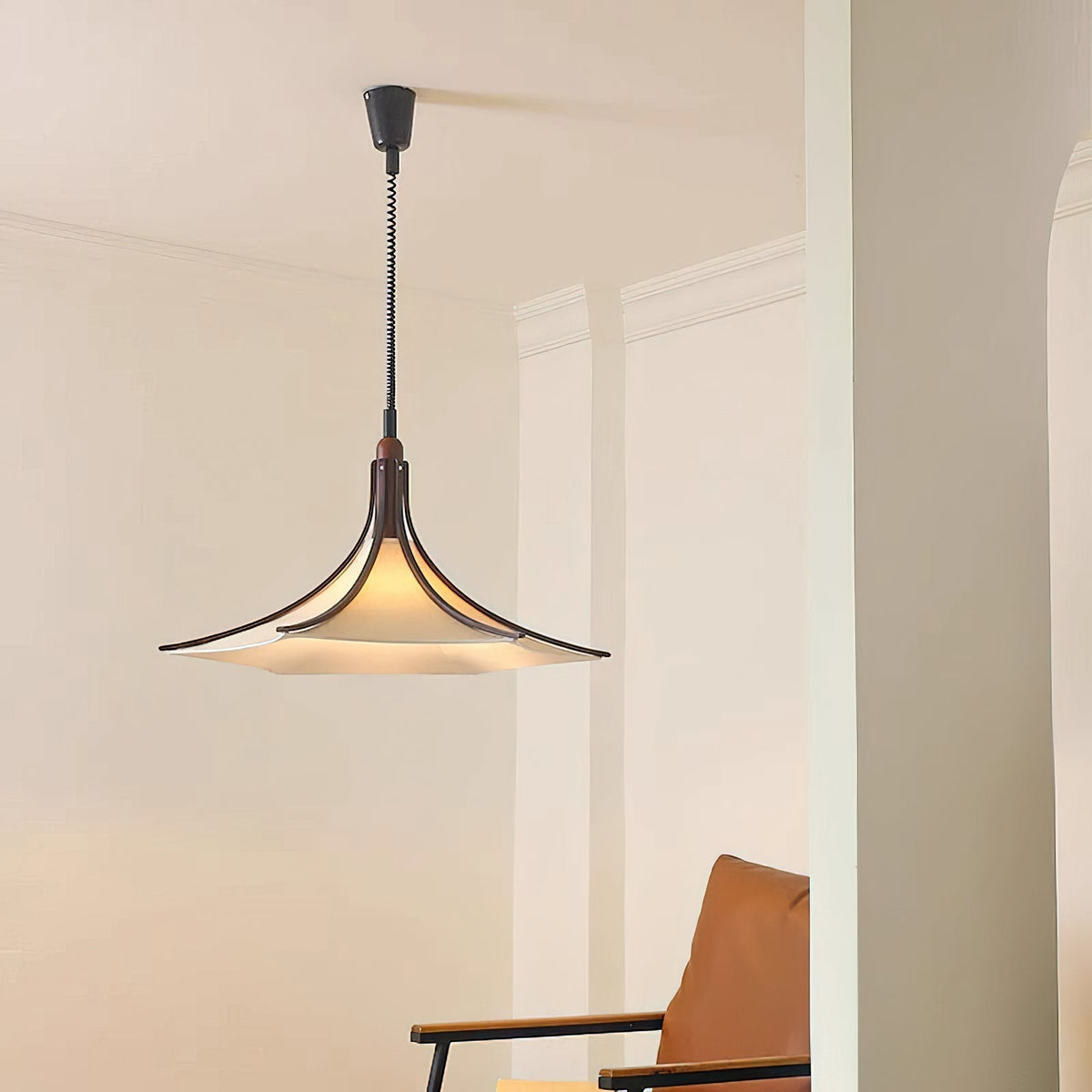 Angled view of the Domus Pendant Light highlighting its sculptural form.