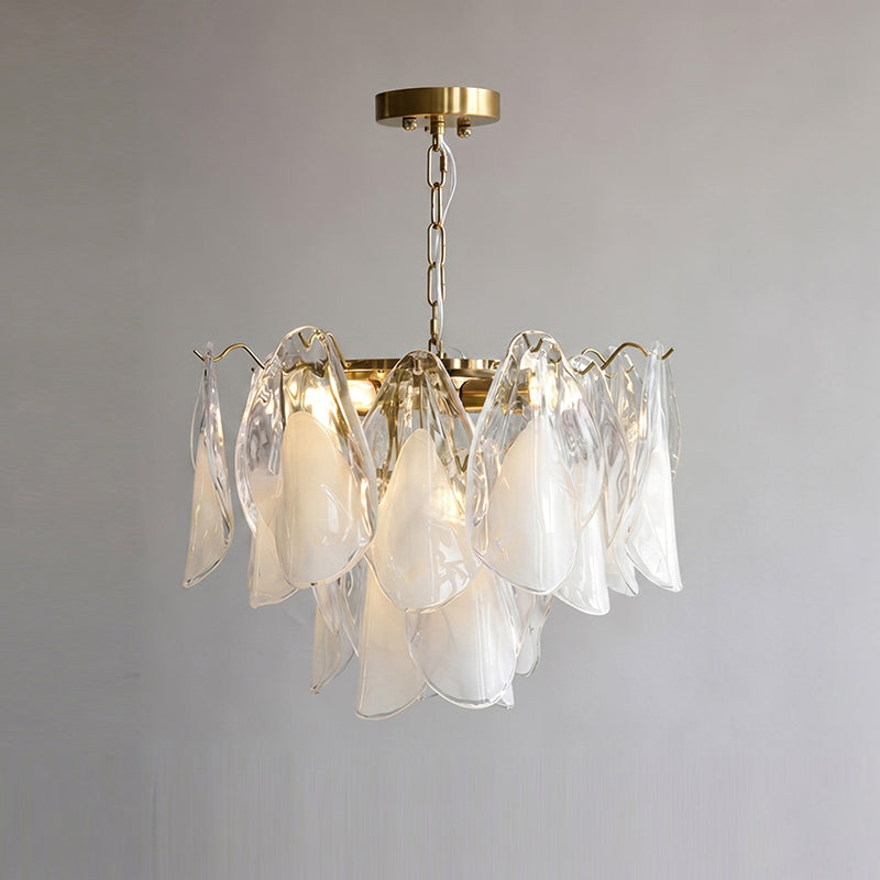 Foliage Glass Chandelier creating a warm ambiance in a dark room