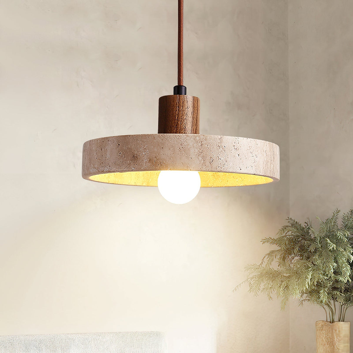 Kairi Pendant Lamp with two travertine shades in a linear arrangement.