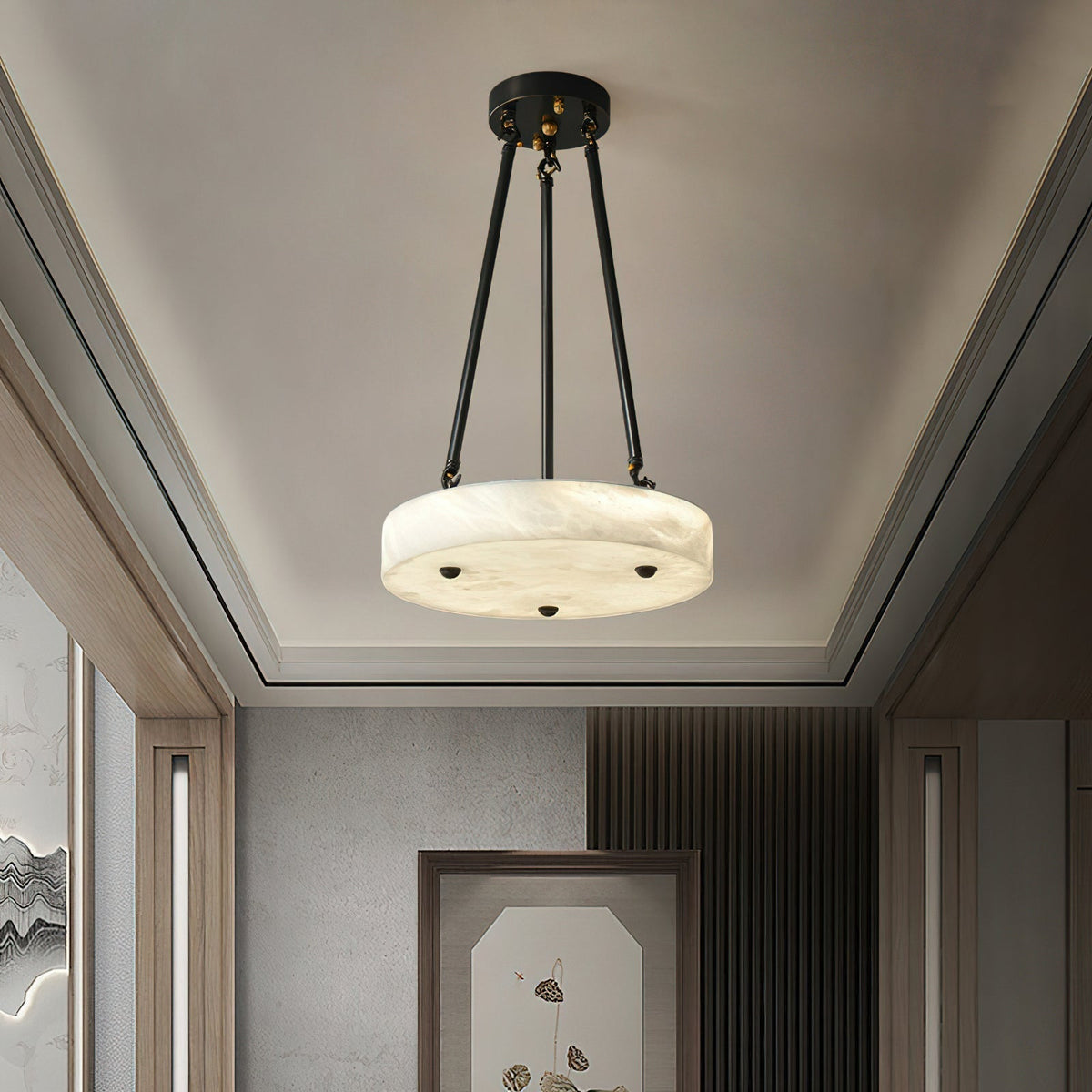 Kayme Alabaster Pendant Lamp illuminated, showing its warm, ethereal glow.