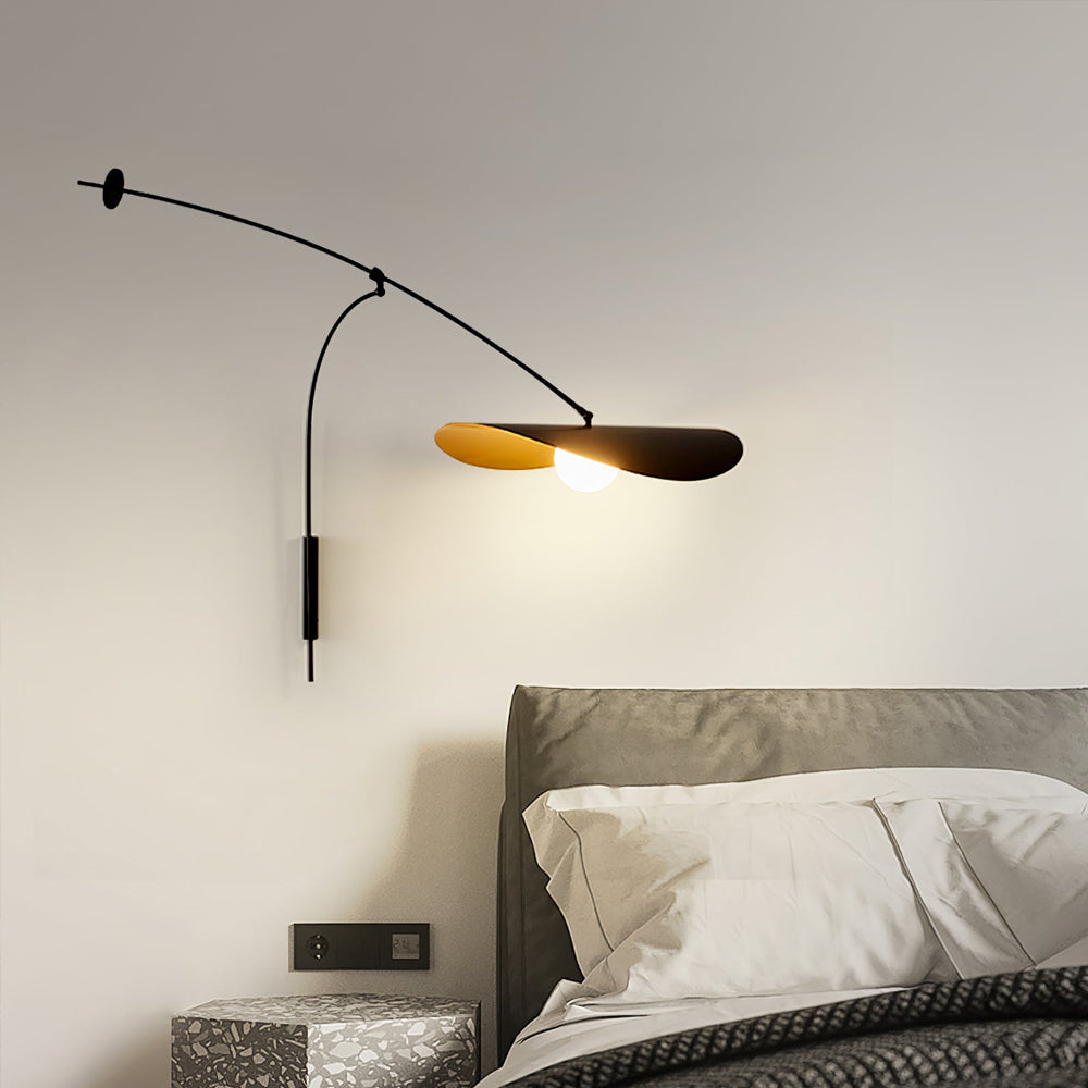 The sculptural silhouette of the Myrna Wall Lamp.