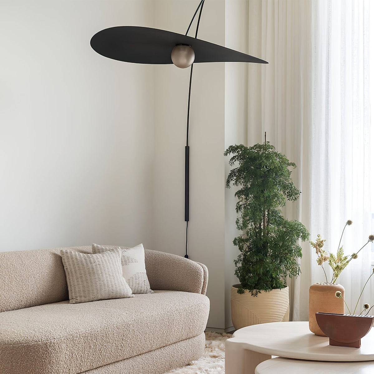 Myrna Plug-In Wall Lamp from a high angle.