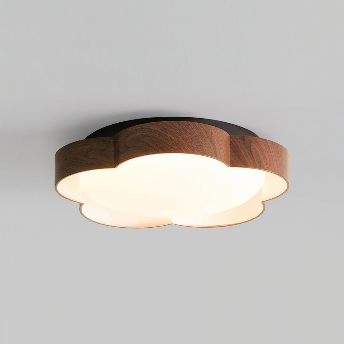 Close-up of the orange accent on the beige finish lamp.