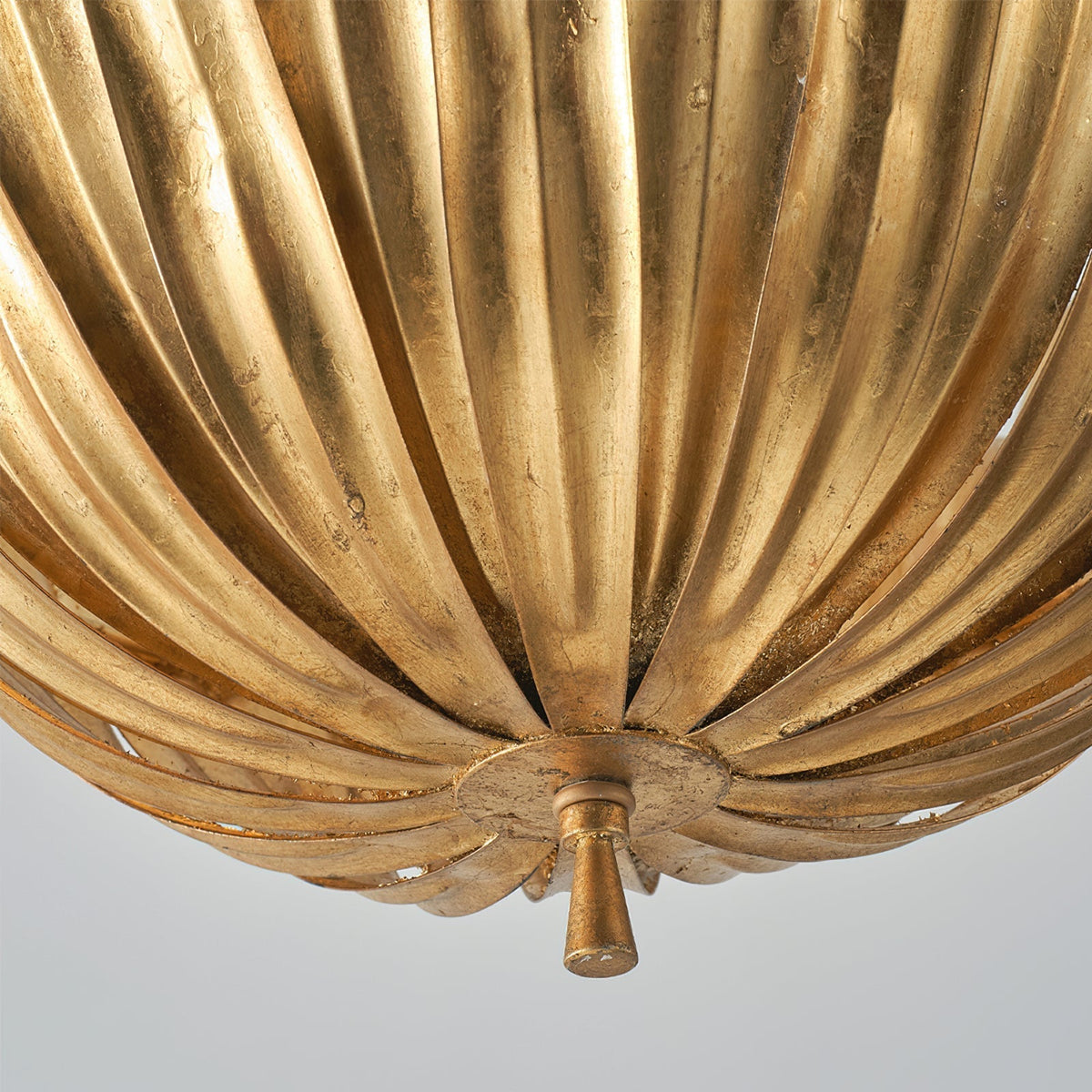 Angled view of the large Vicenzio Leaf Pendant Light in gold.