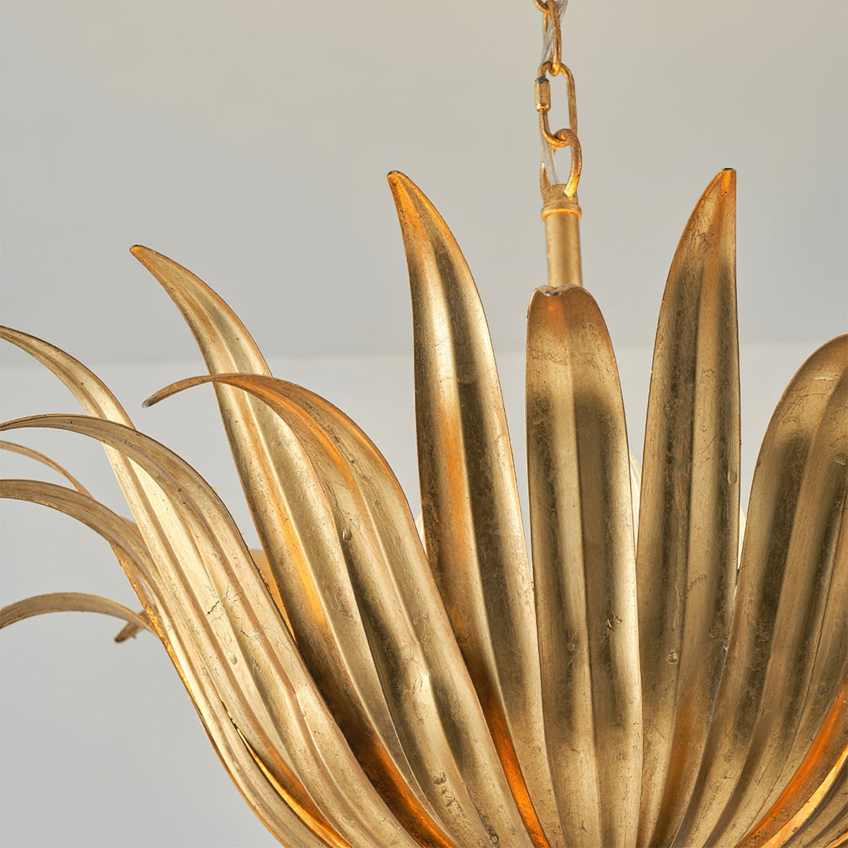 The small Vicenzio Leaf Pendant Light hanging from the ceiling.