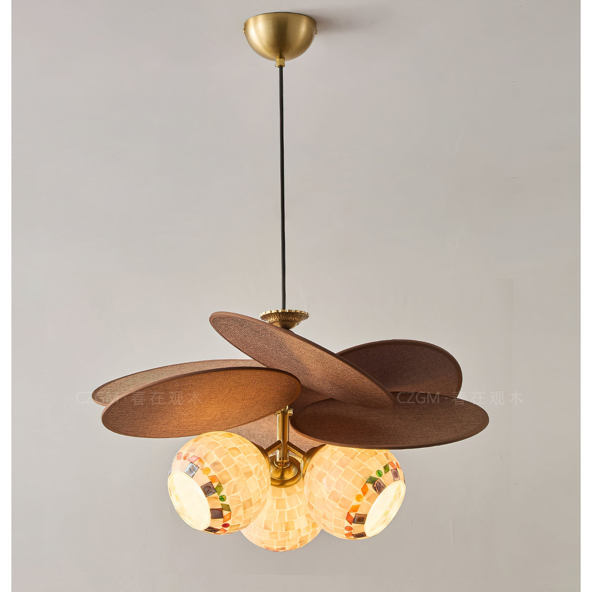 Another angle of the chandelier in a bright, modern living room.