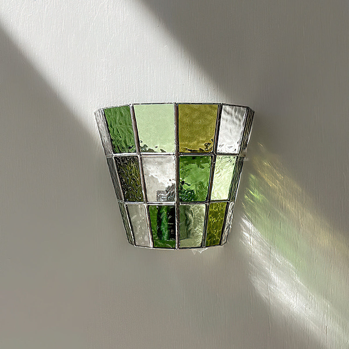 Front view of the Zola Glass Sconce in the amber glass option.