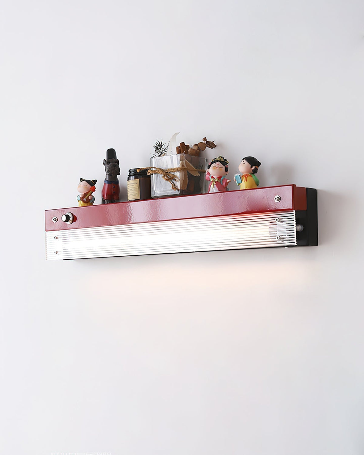 Comparison of the red, orange, and yellow Totem Wall Lamps.