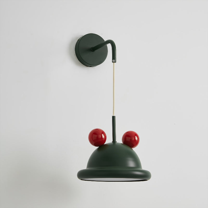 The green and red Aries Wall Lamp turned off.