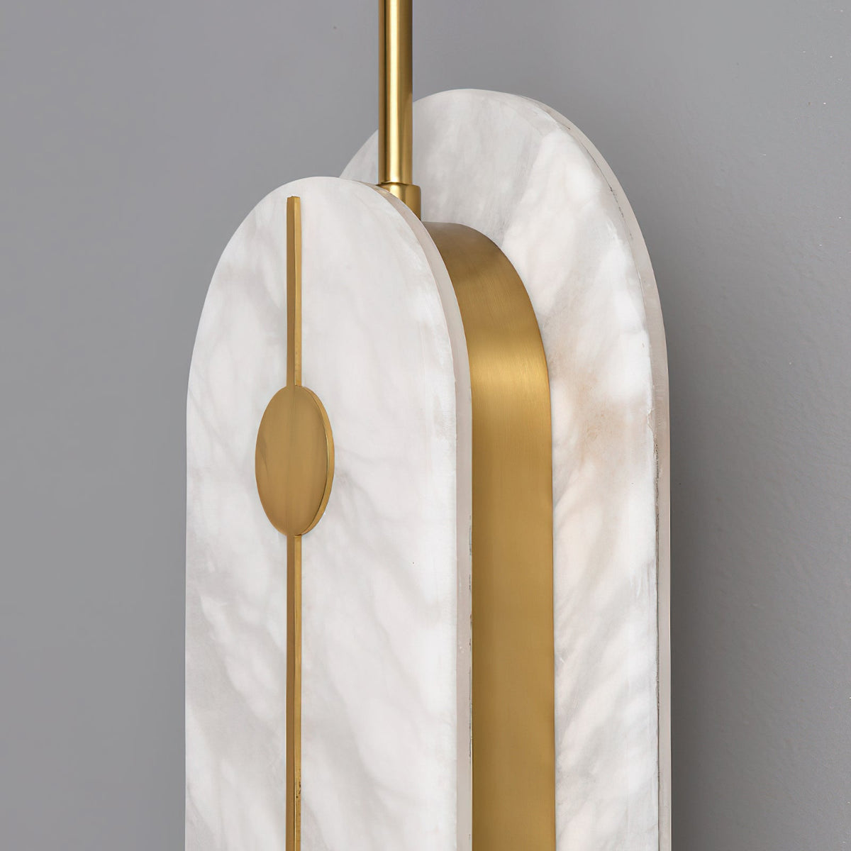 The Brace Alabaster Wall Lamp with the white finish option.