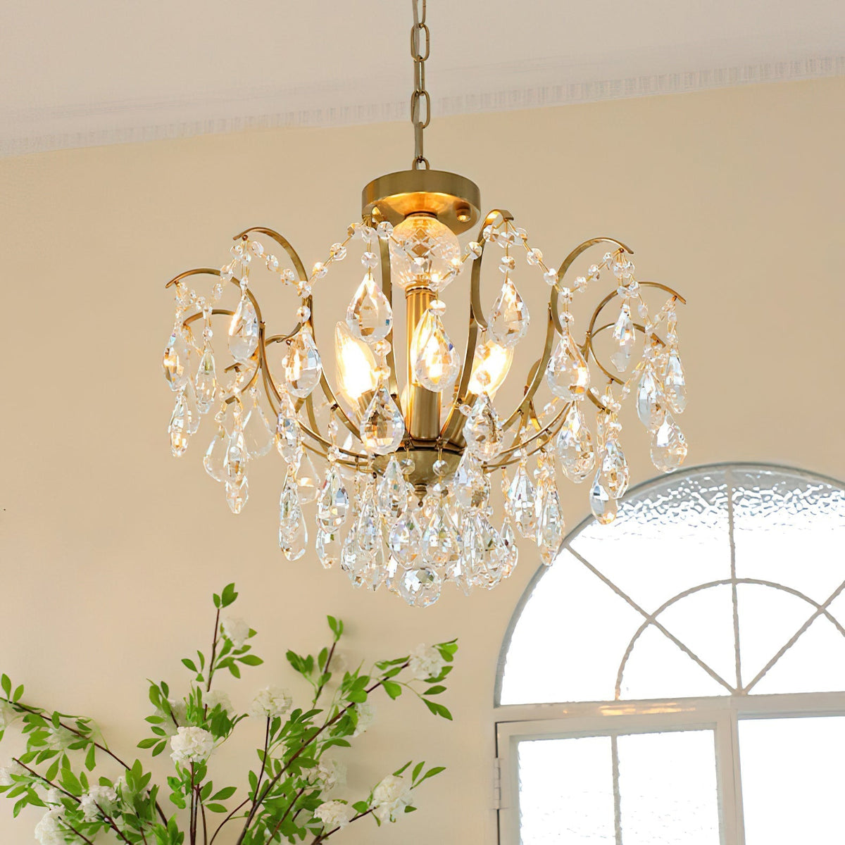 Angled view showcasing the chandelier's feminine silhouette.