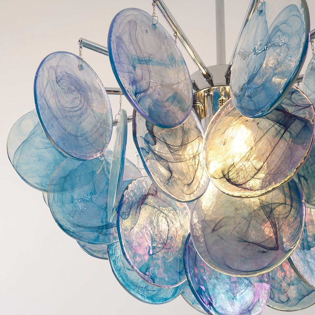 A full display of all available colors of the Camisa Chandelier.