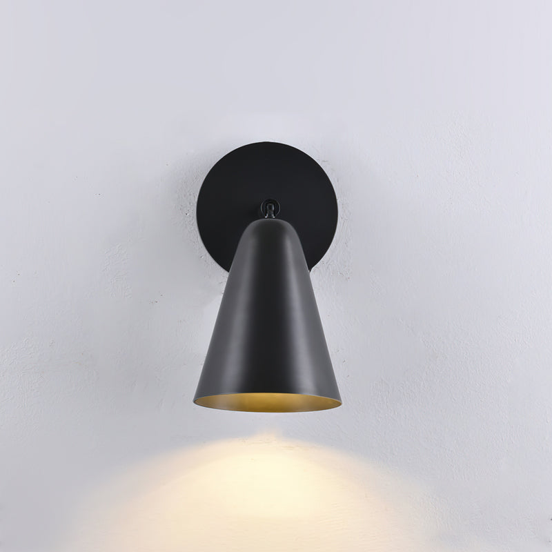 The sconce shown with a modern LED bulb.