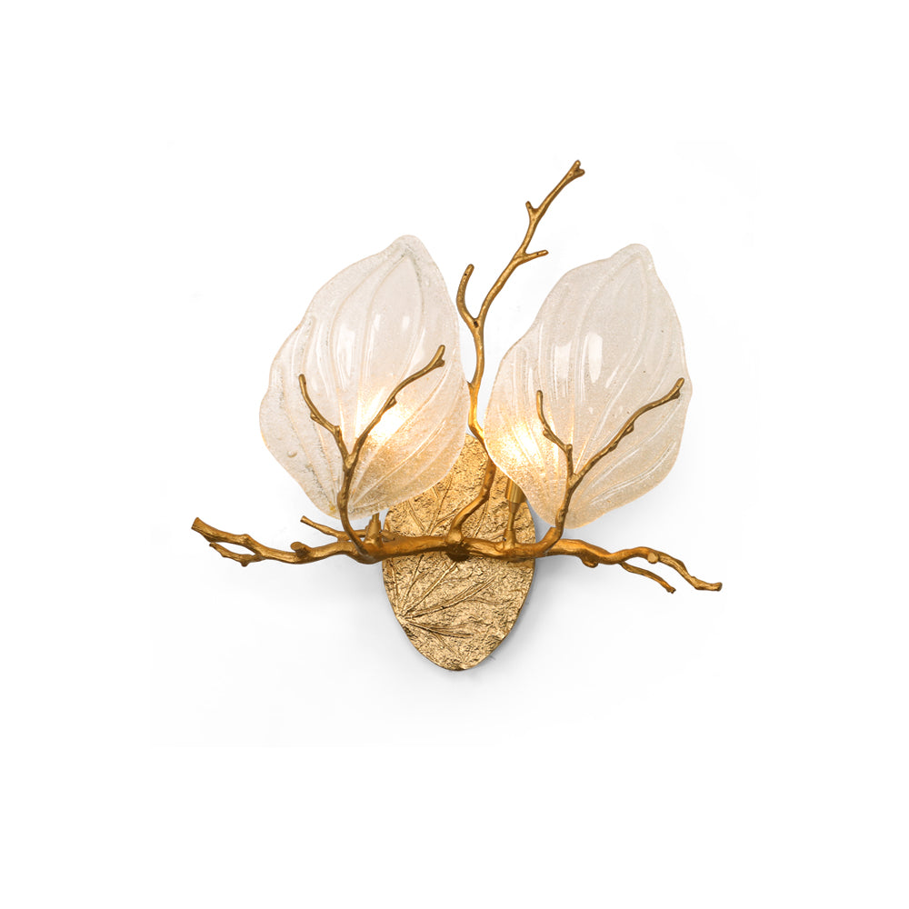 Front view of the Magnolia Leaf Branch Brass Sconce on a light wall.
