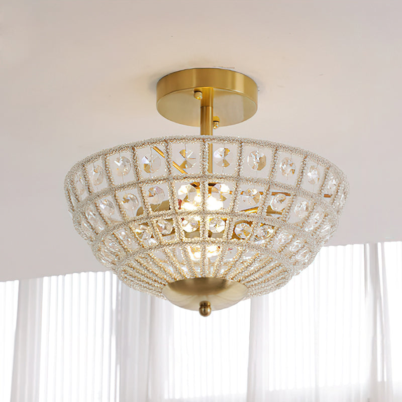 The Devan Crystal Ceiling Light illuminated, casting a warm, sparkling glow.