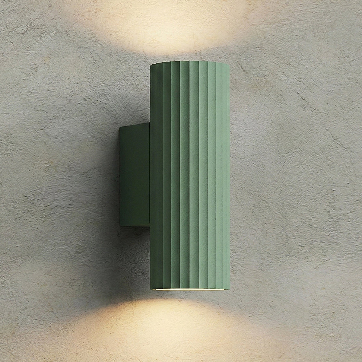 Lifestyle image showing the white Dunbar Wall Light in a hallway.