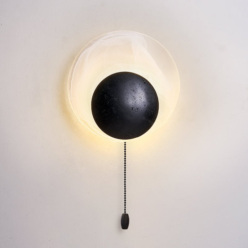 Orla Applique Murale en Coquille de Travertin Noir Cosmica Eclipse