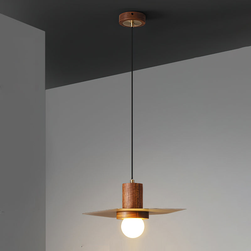 A close-up view of the lamp's construction, showing the wood and brass combination.