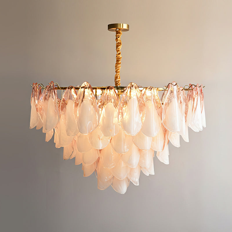 White version of the Foliage Glass Chandelier hanging in a bright room