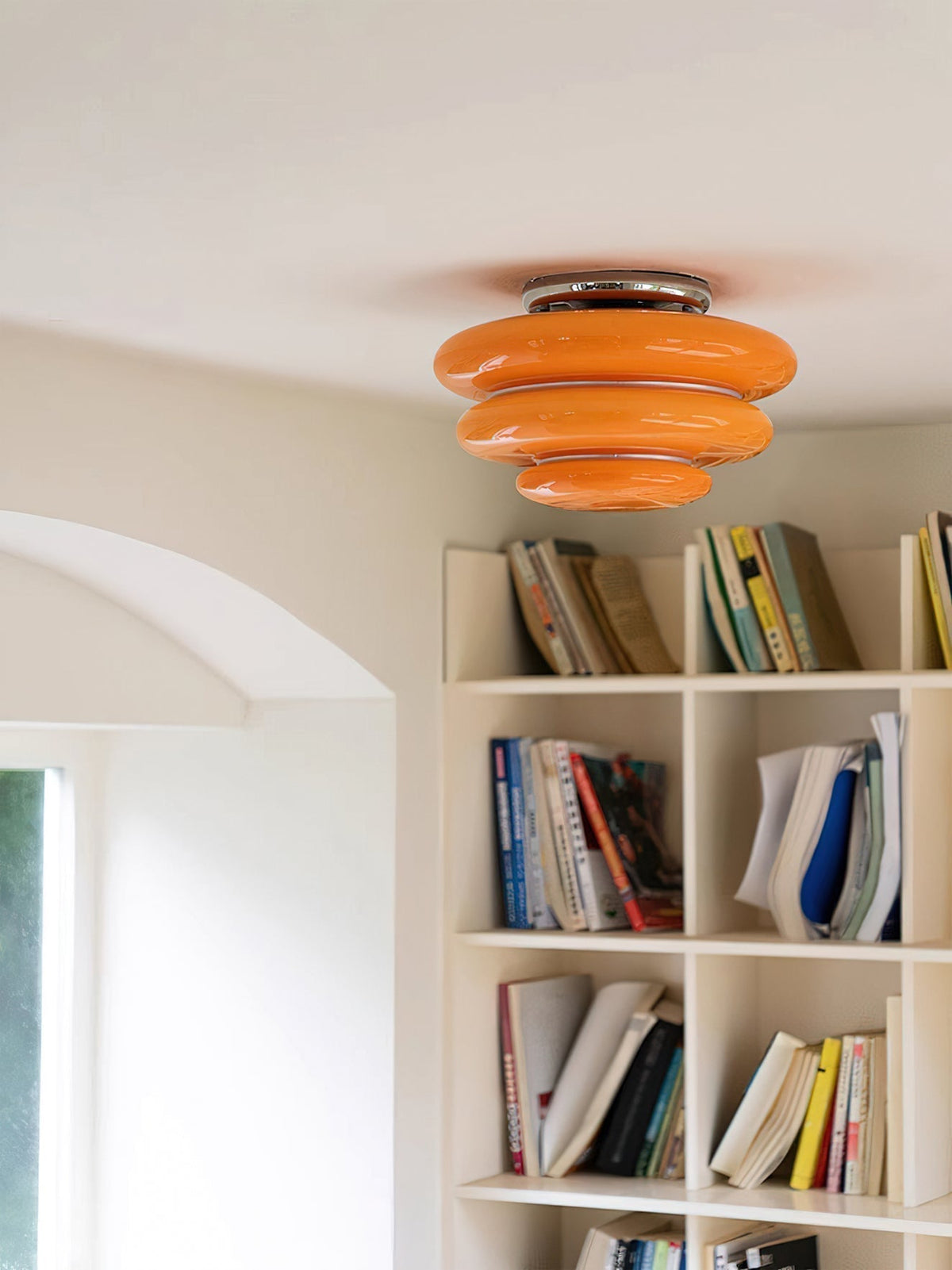 Detail shot of the chrome and glass accents on the Gispen ceiling fixture.