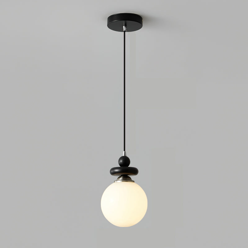 The Maru Pendant Light shown with a vintage-style Edison bulb.