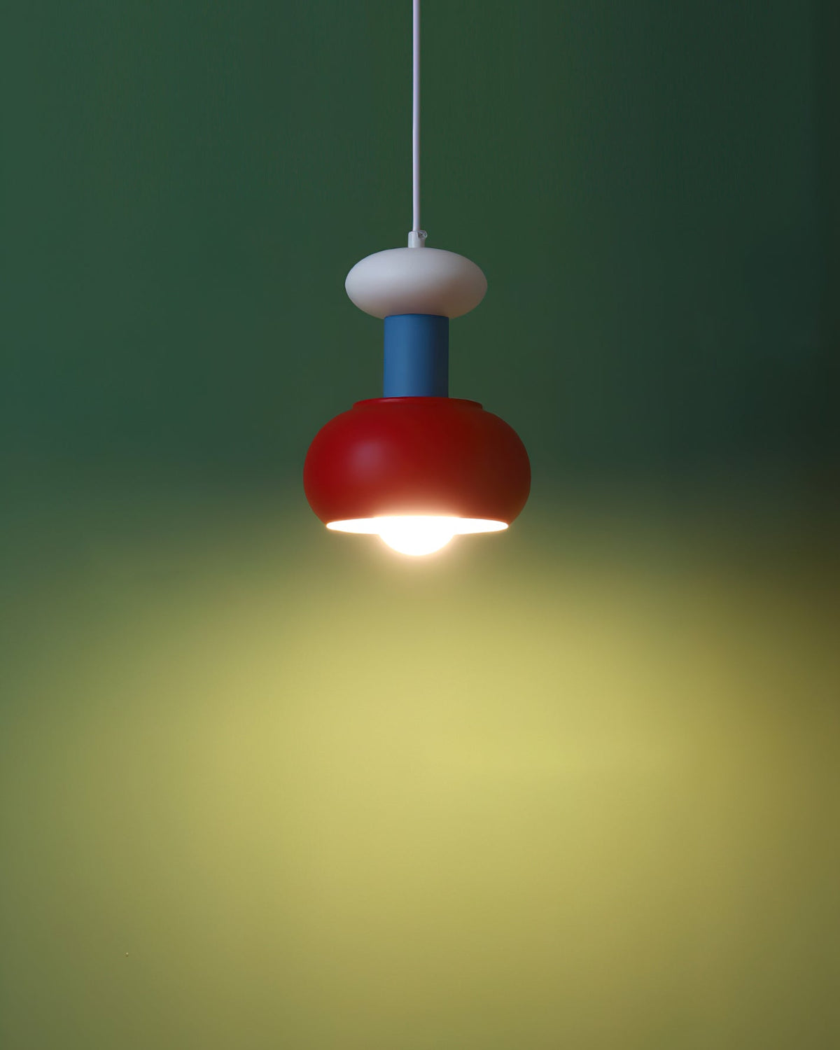The Meli Pendant Light against a neutral background to emphasize its colors.