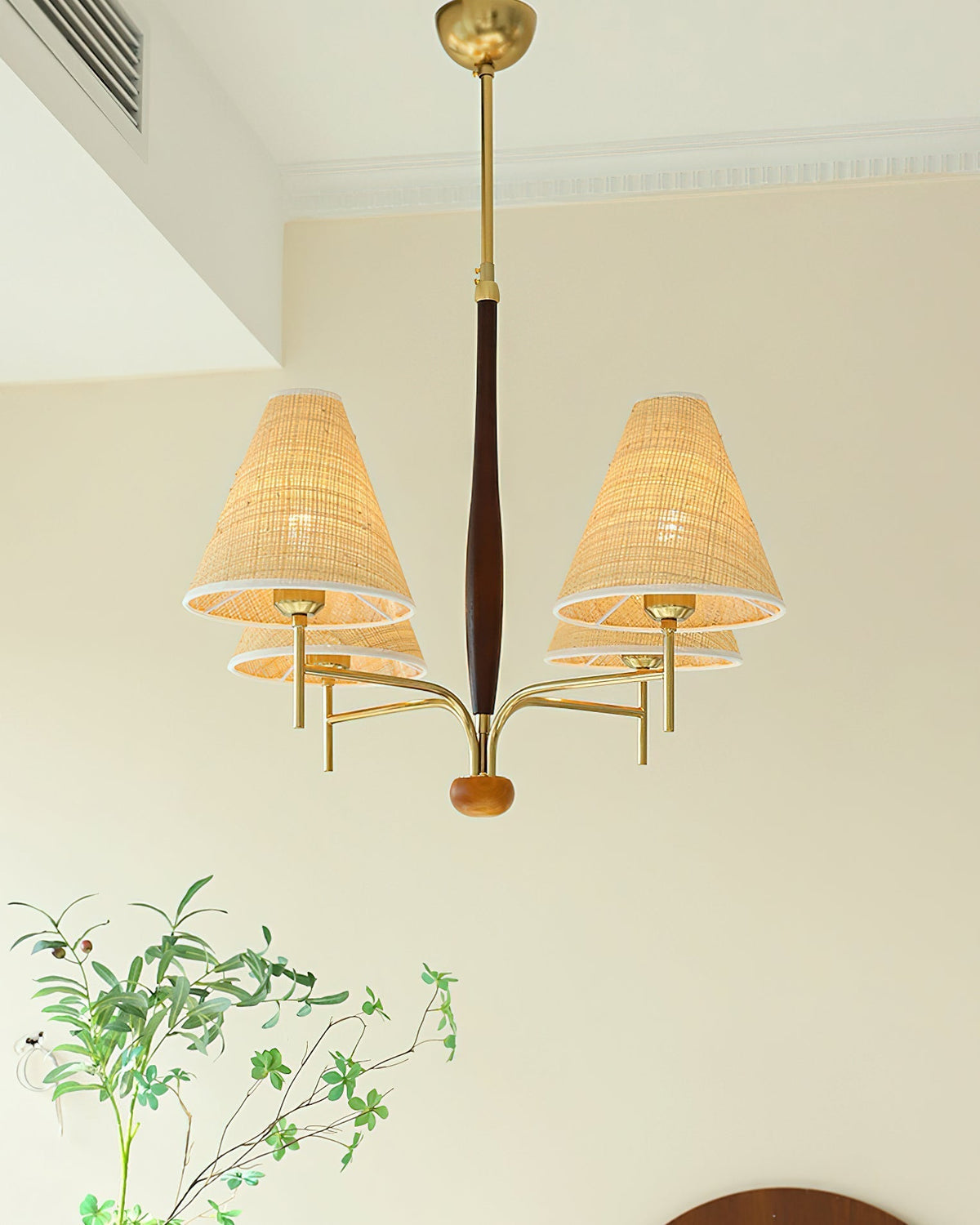 Close-up of a beige fabric shade on the Mercer Chandelier.