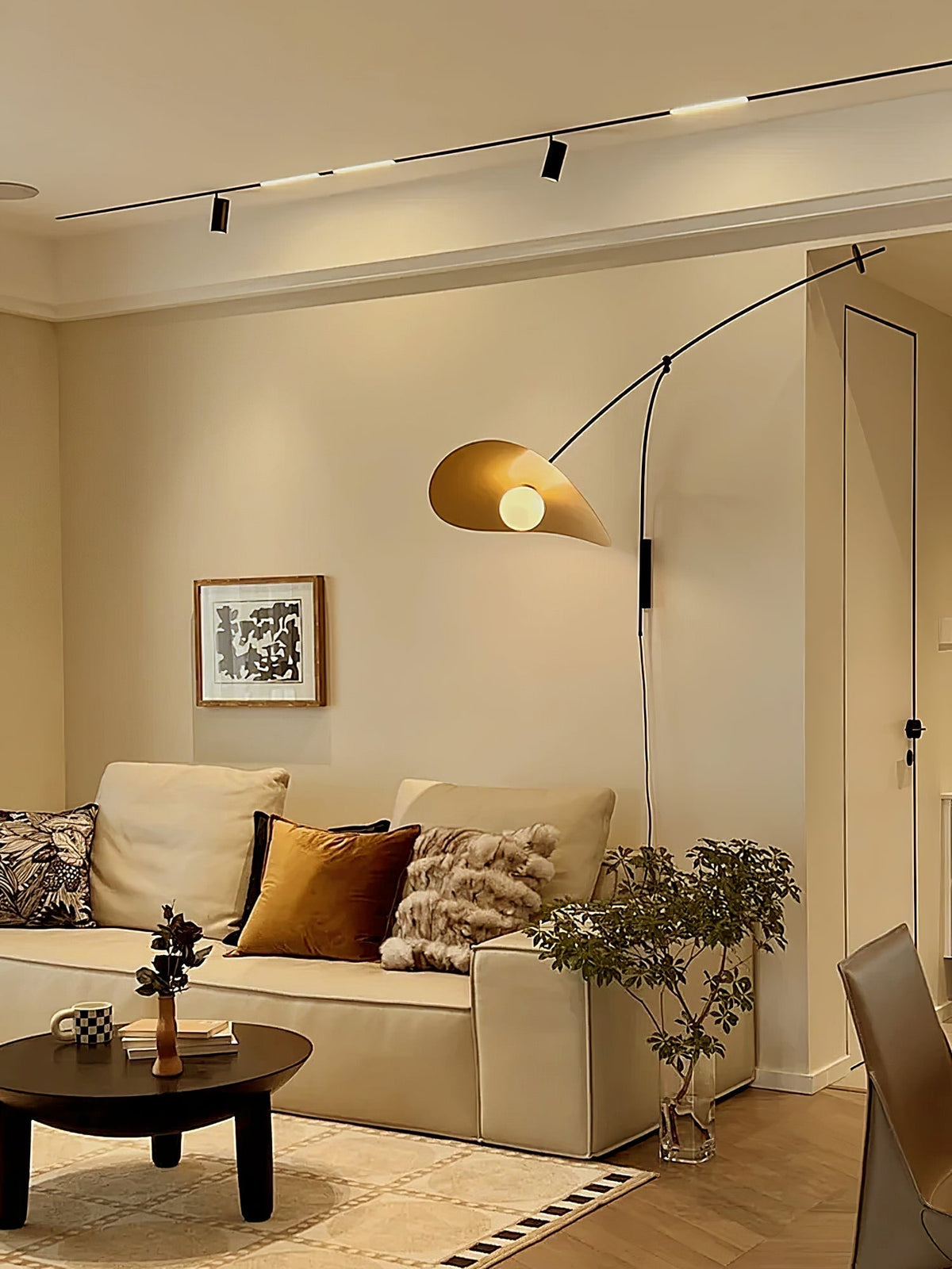 Myrna Plug-In Wall Lamp in black with glass shades.