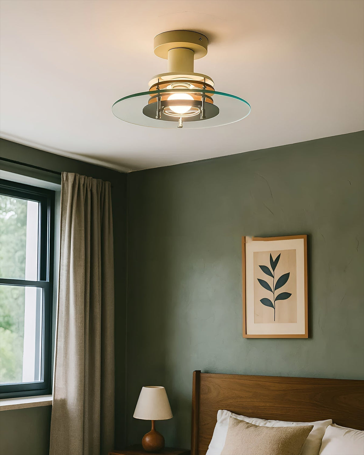 Side profile of the Nello Ceiling Lamp against a neutral wall.