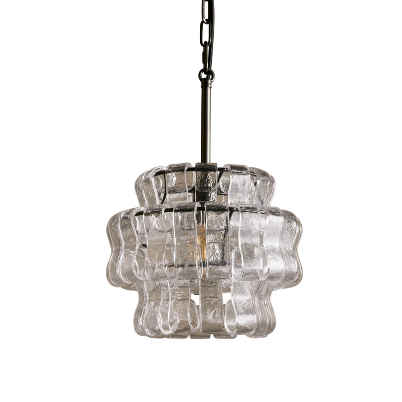 Lifestyle image featuring the Clear & Gold Nirsa Pendant Light in a stylish bedroom.