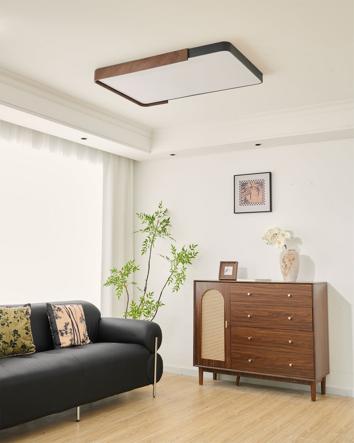 Orren Ceiling Light with warm light turned on in a cozy setting.