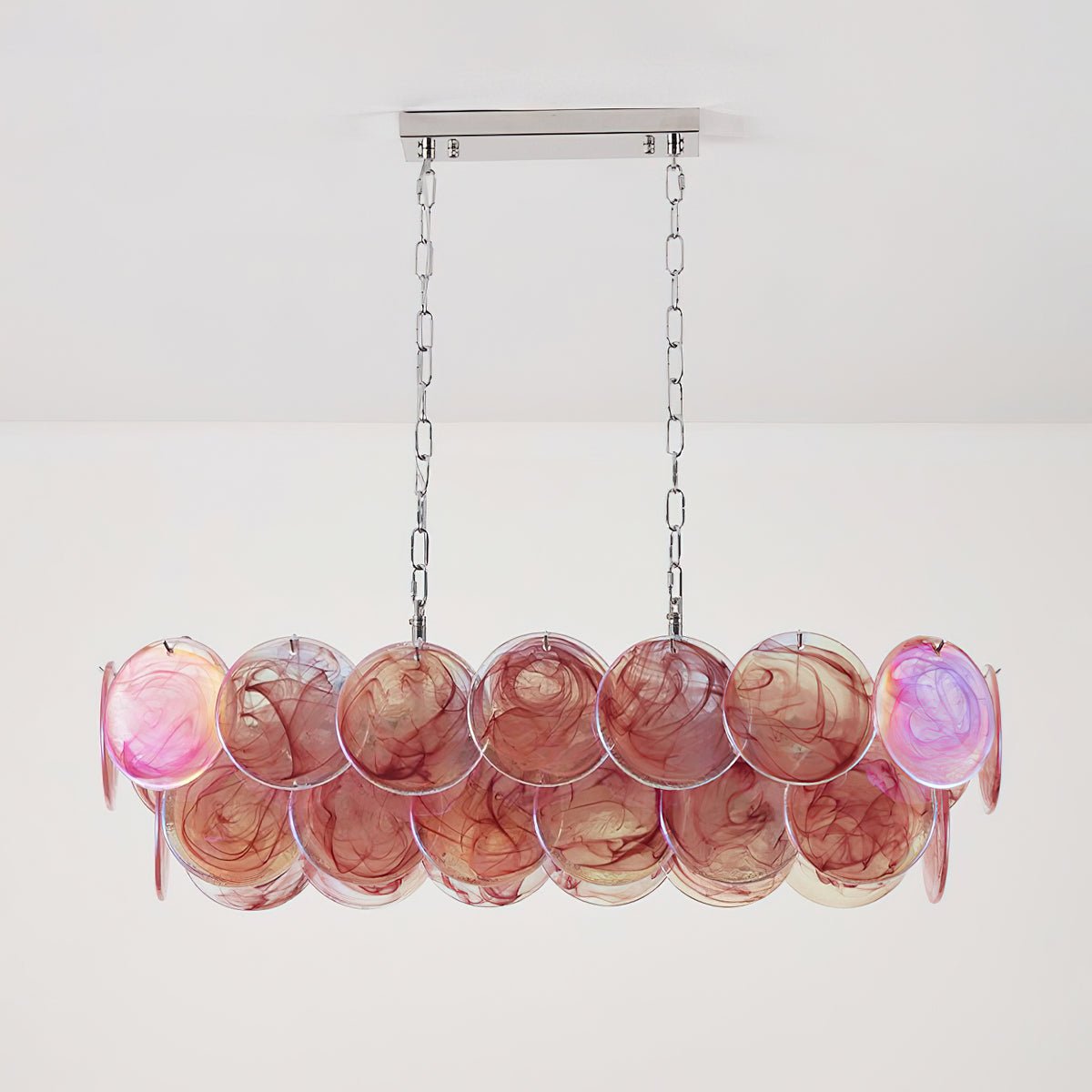 View from below the Pavone Linear Chandelier, showing light diffusion through the glass.
