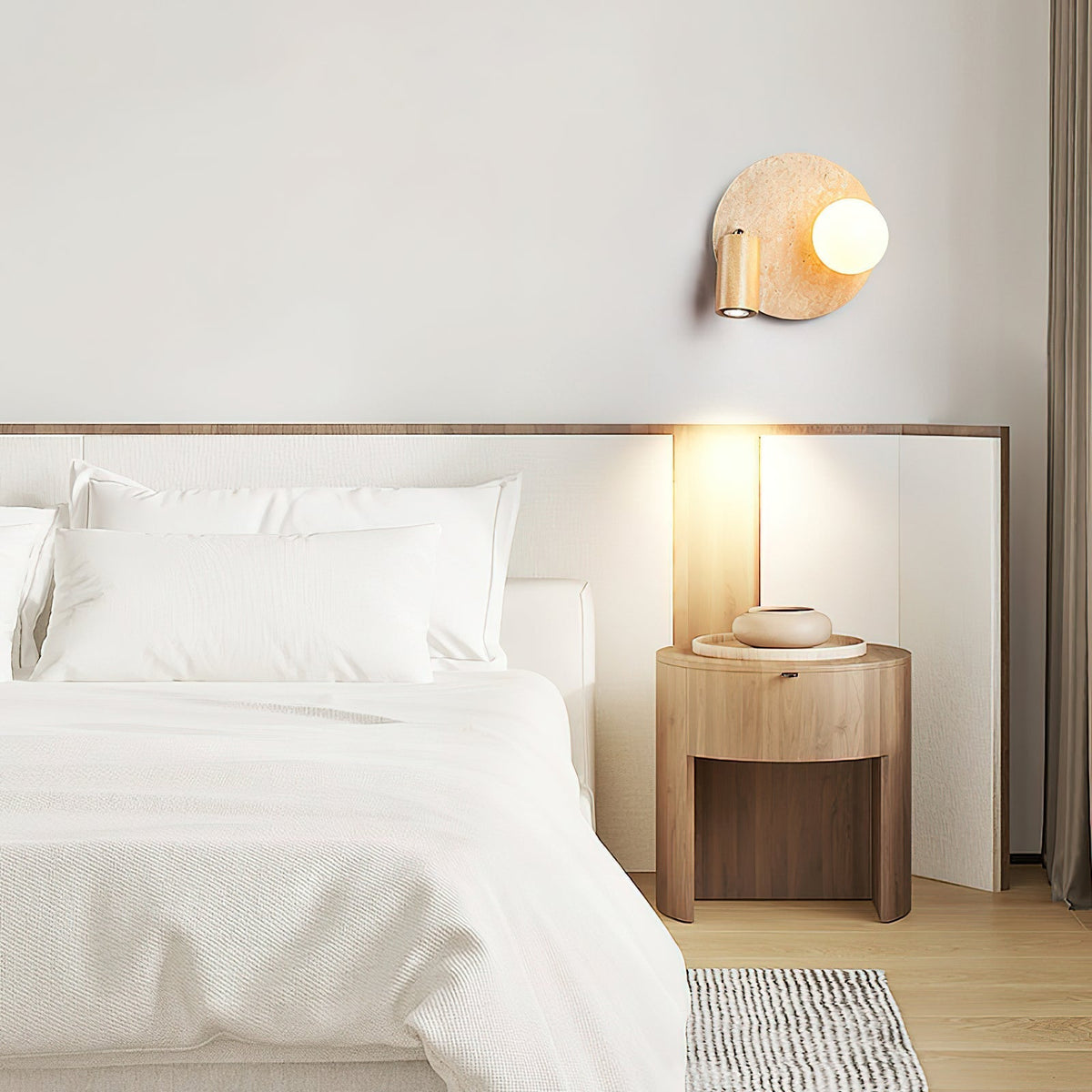 Model B of the Luka Wall Lamp with its rectangular travertine base.