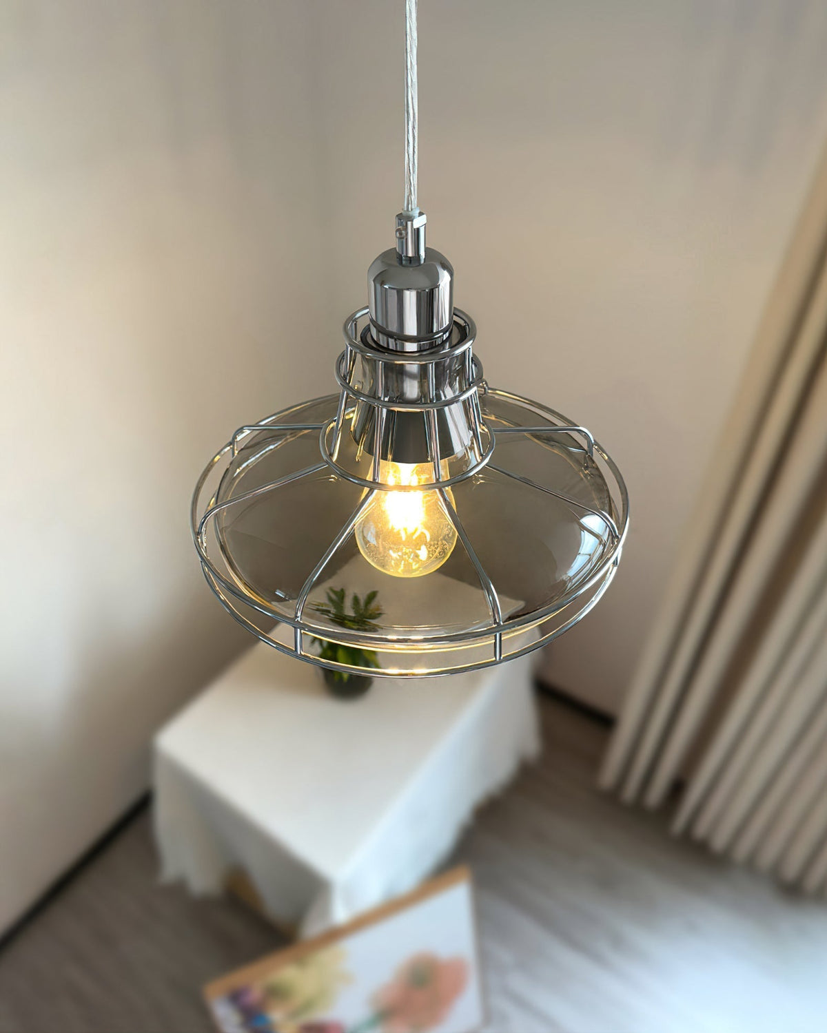 Williston Pendant Light hanging over a kitchen island.