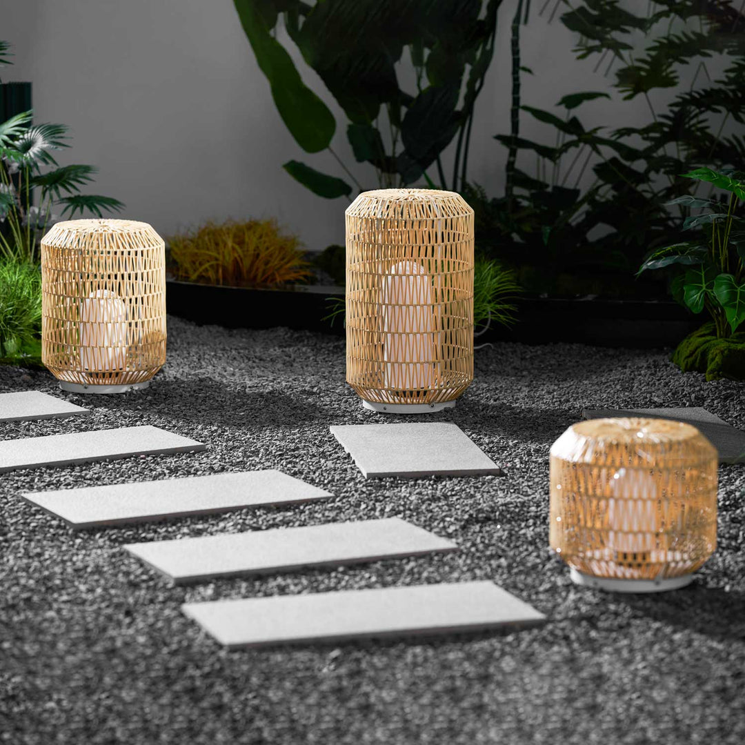 Outdoor lamp casting a warm and inviting glow at night.