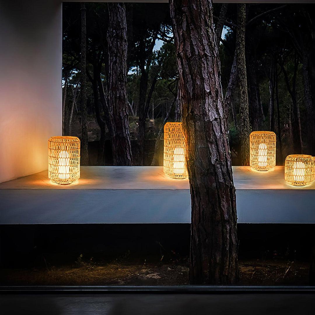 Woven rattan outdoor lamp in a different size option.