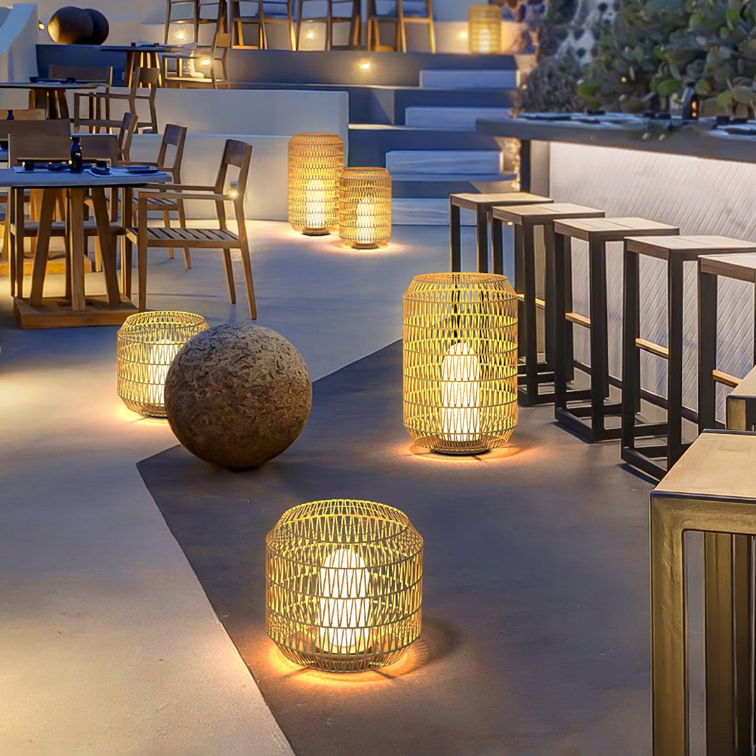 Woven rattan outdoor lamp in a different size option.