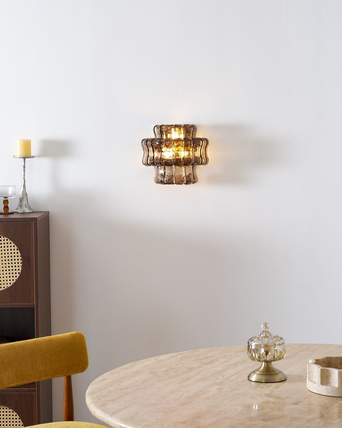 Angled shot of the black glass Albano Wall Lamp.